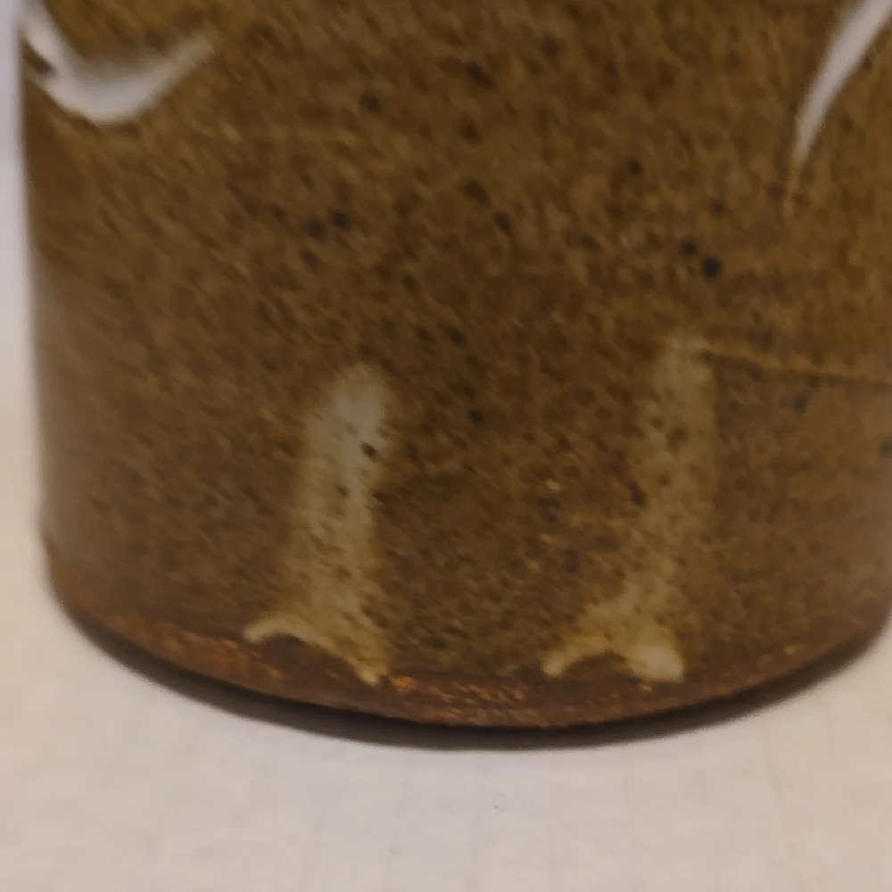 Brown Signed Pottery Vase with White Floral Design